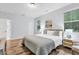 Inviting bedroom with natural light, comfy bed, and stylish decor at 4698 Cloisters Ln., Myrtle Beach, SC 29577