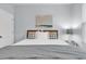 Bright bedroom with a comfortable bed, stylish decor, and wood-look flooring at 4698 Cloisters Ln., Myrtle Beach, SC 29577