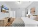 Bright bedroom featuring a TV and stylish decor at 4698 Cloisters Ln., Myrtle Beach, SC 29577