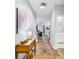 Inviting hallway with wood floors, a console table, and an open view to the living spaces at 4698 Cloisters Ln., Myrtle Beach, SC 29577