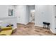 Hallway showing a bathroom, bedroom and hardwood floors at 4698 Cloisters Ln., Myrtle Beach, SC 29577