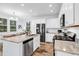 Kitchen featuring white cabinets, stainless steel appliances, granite countertops, and hardwood flooring at 4698 Cloisters Ln., Myrtle Beach, SC 29577