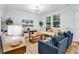Inviting living space with modern furniture, fireplace, and abundant natural light at 4698 Cloisters Ln., Myrtle Beach, SC 29577