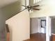 Spacious room with fan, stairs, and laundry area at 500 Fairway Village Dr. # 6E, Myrtle Beach, SC 29588