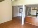 Living room area with appliances and laundry tucked away in closet at 500 Fairway Village Dr. # 6E, Myrtle Beach, SC 29588