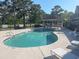 Community pool with chairs and tables and shady gazebo at 500 Fairway Village Dr. # 6E, Myrtle Beach, SC 29588