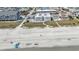 Aerial view of a beach with people and buildings with pools at 5000 N Ocean Blvd. # F2, North Myrtle Beach, SC 29582
