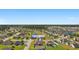 Aerial shot of 509 Fallen Leaf Ct nestled in a serene neighborhood with ponds and lush greenery at 509 Fallen Leaf Ct., Myrtle Beach, SC 29588