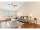 Spacious living room with hardwood floors, a vaulted ceiling, and abundant natural light at 509 Fallen Leaf Ct., Myrtle Beach, SC 29588