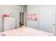 Comfortable bedroom featuring pink bedding, a white dresser, and a calming atmosphere at 5140 Yellowstone Dr., Conway, SC 29526