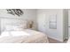 Serene bedroom featuring a white bed frame, soft bedding, and natural light at 5140 Yellowstone Dr., Conway, SC 29526