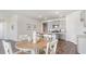An open-concept view of the kitchen and dining area featuring modern stainless steel appliances at 5140 Yellowstone Dr., Conway, SC 29526