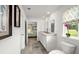 Well-lit bathroom with double sinks, modern fixtures, and a serene view at 5153 Yellowstone Dr., Conway, SC 29526