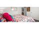 Comfortable bedroom featuring bright floral bedding, decorative pillows, and modern wall art at 5153 Yellowstone Dr., Conway, SC 29526