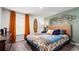 A cozy bedroom with a unique accent wall, stylish bedding, and coordinated furniture at 5153 Yellowstone Dr., Conway, SC 29526