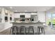 Stylish kitchen with white cabinets, a breakfast bar, and stainless appliances at 5153 Yellowstone Dr., Conway, SC 29526