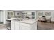 Open-concept kitchen with an island flowing into the living and dining areas at 5153 Yellowstone Dr., Conway, SC 29526