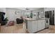 Eat-in kitchen featuring a large island, pendant lighting, stainless appliances and natural light at 5371 Knobcone Loop # D, Myrtle Beach, SC 29577