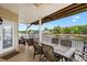 Covered back porch with dining and seating and water views at 6001-308 South Kings Hwy., Myrtle Beach, SC 29575