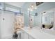 Well-lit bathroom with a shower and a large mirror at 6001-308 South Kings Hwy., Myrtle Beach, SC 29575