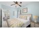 Bright bedroom with coastal decor, ceiling fan, and a view of the sun room at 6001-308 South Kings Hwy., Myrtle Beach, SC 29575