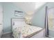 Light-filled bedroom with coastal decor and vaulted ceilings at 6001-308 South Kings Hwy., Myrtle Beach, SC 29575