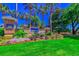 Beautiful community entrance with flowers, lawn and palm trees at 6001-308 South Kings Hwy., Myrtle Beach, SC 29575