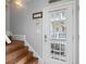 Stairwell with wood treads and a view of the back deck at 6001-308 South Kings Hwy., Myrtle Beach, SC 29575