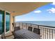 Oceanfront balcony with comfortable seating, offering stunning views of the sea and beach at 603 S Ocean Blvd. # 1205, North Myrtle Beach, SC 29582