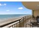 Relax on the balcony with a view of the beach and beautiful blue ocean at 603 S Ocean Blvd. # 1205, North Myrtle Beach, SC 29582