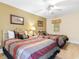 This bedroom features two beds with red and brown bedding, providing a comfortable and stylish retreat at 603 S Ocean Blvd. # 1205, North Myrtle Beach, SC 29582