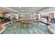 Spacious indoor pool area with several seating areas at 603 S Ocean Blvd. # 1205, North Myrtle Beach, SC 29582