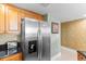 A stainless steel refrigerator is seen in this image of a modern kitchen at 603 S Ocean Blvd. # 1205, North Myrtle Beach, SC 29582