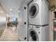 Convenient laundry area with a stackable washer and dryer for easy laundry days at 603 S Ocean Blvd. # 1205, North Myrtle Beach, SC 29582