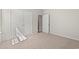 Bedroom featuring soft carpet, neutral walls, double closet, and natural light at 609 Carter Reid Ct., Longs, SC 29568
