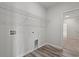 Functional laundry room with ample space and convenient shelving at 609 Carter Reid Ct., Longs, SC 29568