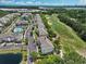 Aerial view of golf course condo featuring water views, golf views, and a community pool at 6203 Catalina Dr. # 1832, North Myrtle Beach, SC 29582