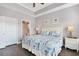 Charming bedroom featuring a queen bed, ensuite bathroom, and tasteful nautical decor at 6203 Catalina Dr. # 1832, North Myrtle Beach, SC 29582