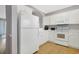Bright kitchen with white appliances and ample counter space at 6203 Catalina Dr. # 1832, North Myrtle Beach, SC 29582
