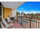 Balcony view overlooking a pool and the beach, with seating at 6900 N Ocean Blvd. # 208, Myrtle Beach, SC 29572
