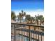 Balcony view of a lazy river pool and palm trees leading to the beach at 6900 N Ocean Blvd. # 208, Myrtle Beach, SC 29572