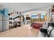 Bright studio apartment with wood floors, a balcony, and a modern kitchenette at 6900 N Ocean Blvd. # 208, Myrtle Beach, SC 29572