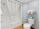 Clean and functional bathroom with a shower-tub combo, toilet, and neatly arranged towels at 7100 Ocean Blvd. N # 1425, Myrtle Beach, SC 29572