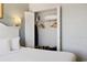 Walk-in closet with ample storage space, including shelving, a safe, and hanging rods at 7100 Ocean Blvd. N # 1425, Myrtle Beach, SC 29572