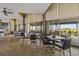Relaxing dining room with sliding glass doors with ocean views and a cozy outdoor patio seating area at 7100 Ocean Blvd. N # 1425, Myrtle Beach, SC 29572