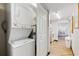 Convenient in-unit laundry area with stacked washer and dryer units at 7100 Ocean Blvd. N # 1425, Myrtle Beach, SC 29572