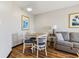 Cozy dining area and living space featuring a round table and comfortable sofa seating at 7100 Ocean Blvd. N # 1425, Myrtle Beach, SC 29572