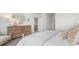 Bedroom featuring a decorative dresser and cozy chair, with natural light at 719 Chazen Way, Longs, SC 29568
