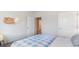 Bright bedroom with a full-sized bed and direct access to the hallway at 719 Chazen Way, Longs, SC 29568