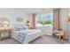 Comfortable bedroom with wallpaper, a large window for natural light, and stylish décor at 719 Chazen Way, Longs, SC 29568